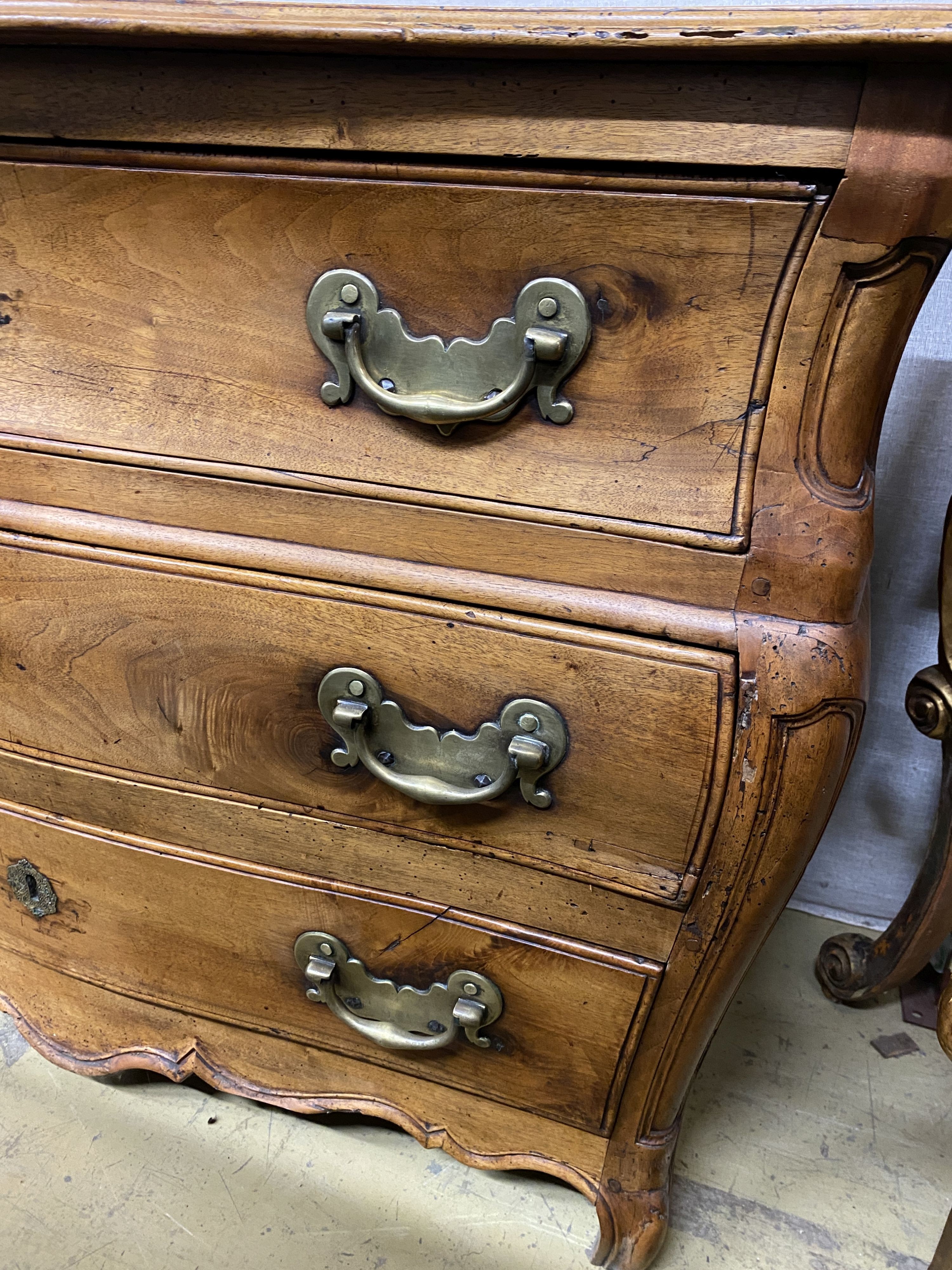 An 18th century Dutch serpentine walnut commode, width 117cm, depth 63cm, height 81cm